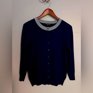 Navy sweater with white checker collar
